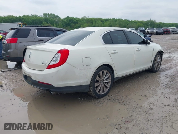 2013 Lincoln MKS EcoBoost with VIN 1LNHL9FT4DG604661, listed as a IAAI auction lot 42211781 with 134,902 mi miles and . Bid and sale history available at DreamBid. Image 4.