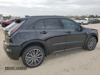 2024 Cadillac XT4 FWD Sport with VIN 1GYFZER46RF213543, listed as a Copart auction lot 83609754 with 3,878 mi miles and Salvage title. Bid and sale history available at DreamBid. Image 3.