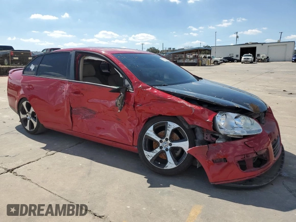 2010 Volkswagen Jetta Wolfsburg Edition with VIN 3VWRJ7AJ6AM069257, listed as a Copart auction lot 73433594 with 184,190 mi miles and Salvage title. Bid and sale history available at DreamBid. Image 4.