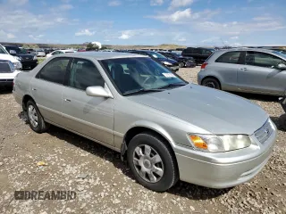 2001 Toyota Camry CE z VIN 4T1BG22K21U058793, wystawiony jako Copart lot #57351245 z przebiegiem 186 095 mil mil oraz Szkoda całkowita • Salvage title. Historia ofert i sprzedaży dostępna na DreamBid. Obrazek 4.