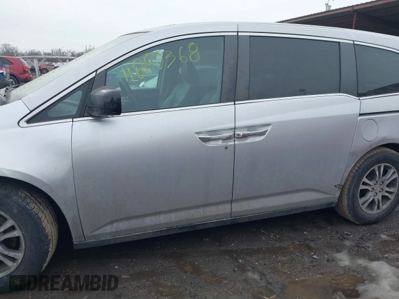 2013 Honda Odyssey EX-L with VIN 5FNRL5H63DB007682, listed as a IAAI auction lot 41408103 with 201,453 mi miles and . Bid and sale history available at carsss.com. Image 14.