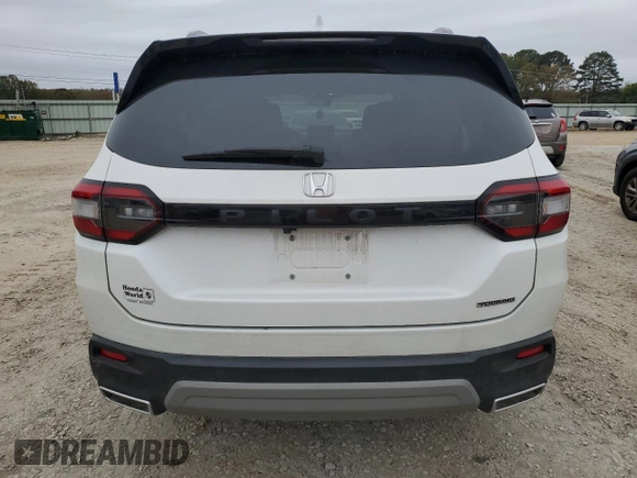 2024 Honda Pilot Touring z VIN 5FNYG2H74RB011187, wystawiony jako Copart lot #79999324 z przebiegiem 16 123 mil mil oraz Szkoda całkowita • Salvage title. Historia ofert i sprzedaży dostępna na DreamBid. Obrazek 6.