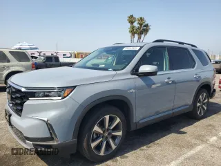 2024 Honda Pilot Touring with VIN 5FNYG2H70RB015527, listed as a Copart auction lot 59353985 with 21,461 mi miles and Salvage title. Bid and sale history available at DreamBid. Image 1.