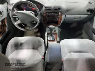 2000 Mitsubishi Galant with VIN 4A3AA46L4YE170903, listed as a Copart auction lot 86874254 with 234,575 mi miles and Salvage Title. Bid and sale history available at DreamBid. Image 8.