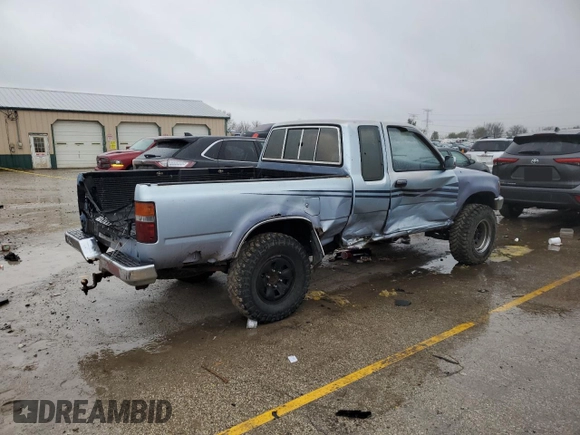 1991 Toyota Pickup DLX z VIN JT4VN13GXM5041525, wystawiony jako Copart lot #80709474 z przebiegiem 309 094 mil mil oraz Szkoda całkowita • Salvage title. Historia ofert i sprzedaży dostępna na DreamBid. Obrazek 3.
