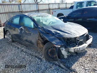 2018 Honda Civic Sedan LX with VIN 19XFC2F58JE016553, listed as a IAAI auction lot 41889434 with 92,045 mi miles. Bid and sale history available at carsss.com. Image 1.