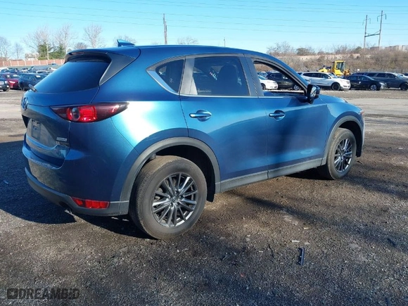 2019 Mazda CX-5 Touring with VIN JM3KFBCM0K0648627, listed as a IAAI auction lot 41838763 with NaN miles. Bid and sale history available at carsss.com. Image 4.