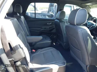 2023 Chevrolet Traverse Premier with VIN 1GNERKKW5PJ128805, listed as a IAAI auction lot 42032622 with 36,463 mi miles and . Bid and sale history available at DreamBid. Image 8.