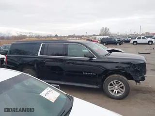 2019 Chevrolet Suburban LT with VIN 1GNSKHKC0KR159583, listed as a IAAI auction lot 41309350 with 196,844 mi miles. Bid and sale history available at carsss.com. Image 13.