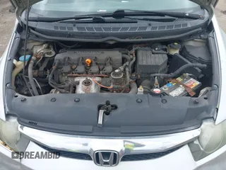 2010 Honda Civic LX with VIN 2HGFA1F59AH323381, listed as a IAAI auction lot 42181040 with 320,419 mi miles and . Bid and sale history available at DreamBid. Image 10.
