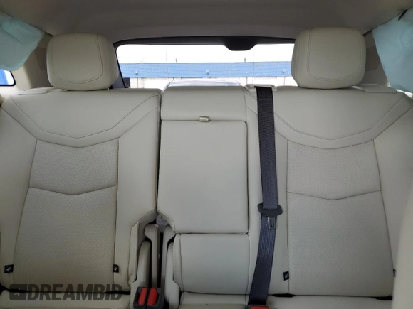 2023 Cadillac XT5 FWD Premium Luxury z VIN 1GYKNCRS5PZ173528, wystawiony jako Copart lot #55805605 z przebiegiem 7 789 mil mil oraz Szkoda całkowita • Salvage title. Historia ofert i sprzedaży dostępna na DreamBid. Obrazek 10.