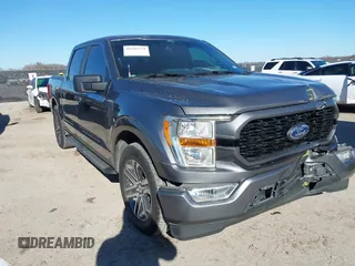 2021 Ford F-150 XL with VIN 1FTEW1C53MFA41047, listed as a IAAI auction lot 41165329 with 87,309 mi miles. Bid and sale history available at carsss.com. Image 1.