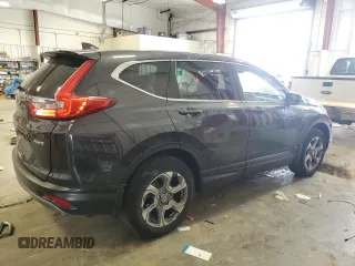 2019 Honda CR-V EX with VIN 5J6RW2H51KL034865, listed as a Copart auction lot 52435455 with 101,597 mi miles and Salvage Title. Bid and sale history available at DreamBid. Image 3.