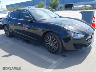 2019 Maserati Ghibli with VIN ZAM57XSA5K1328183, listed as a IAAI auction lot 41970101 with 61,260 mi miles. Bid and sale history available at carsss.com. Image 1.