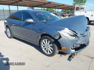 2011 Mazda 6 i Grand Touring with VIN 1YVHZ8CHXB5M27937, listed as a IAAI auction lot 42574587 with 203,952 mi miles and . Bid and sale history available at DreamBid. Image 1.