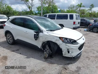 2020 Ford Escape Titanium Hybrid z VIN 1FMCU0DZ3LUC07842, wystawiony jako IAAI lot #42456359 z przebiegiem 62 756 mil mil oraz . Historia ofert i sprzedaży dostępna na DreamBid. Obrazek 1.