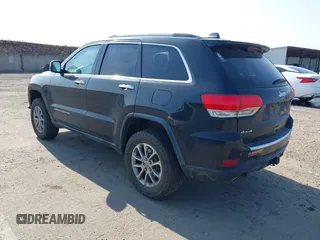 2014 Jeep Grand Cherokee Limited z VIN 1C4RJFBGXEC200729, wystawiony jako IAAI lot #42415661 z przebiegiem 304 061 mil mil oraz . Historia ofert i sprzedaży dostępna na DreamBid. Obrazek 3.