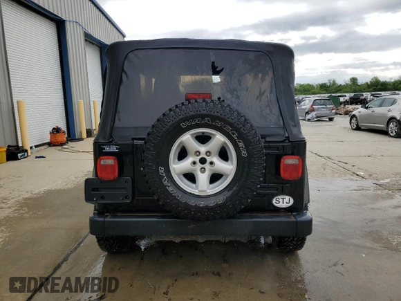 2006 Jeep Wrangler X with VIN 1J4FA39SX6P719070, listed as a Copart auction lot 55598455 with 110,741 mi miles and Salvage title. Bid and sale history available at DreamBid. Image 6.