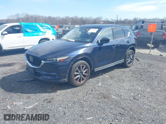 2018 Mazda CX-5 Grand Touring with VIN JM3KFBDM7J0343686, listed as a IAAI auction lot 41813638 with 74,084 mi miles. Bid and sale history available at carsss.com. Image 17.
