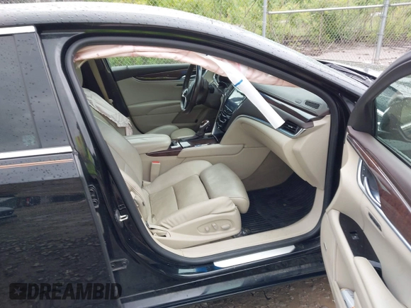 2014 Cadillac XTS Luxury with VIN 2G61M5S32E9231544, listed as a IAAI auction lot 42340088 with 74,518 mi miles and . Bid and sale history available at DreamBid. Image 5.