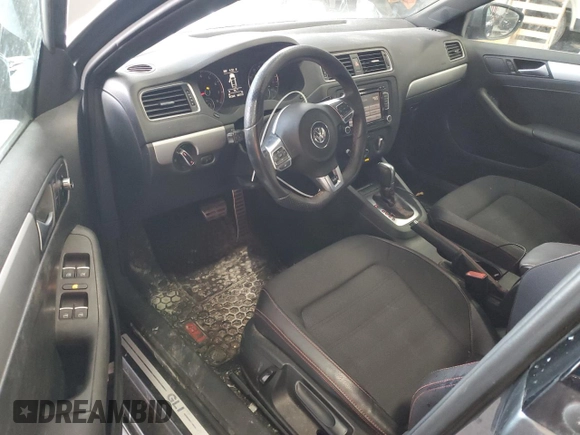 2014 Volkswagen Jetta GLI z VIN 3VW4T7AJ6EM398115, wystawiony jako Copart lot #89179925 z przebiegiem 81 264 mil mil oraz Szkoda całkowita • Salvage title. Historia ofert i sprzedaży dostępna na DreamBid. Obrazek 8.