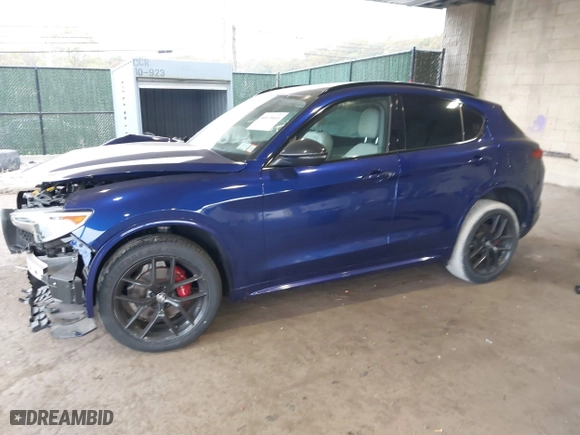 2021 Alfa Romeo Stelvio Ti with VIN ZASPAKBN4M7D21284, listed as a IAAI auction lot 40573443 with 26,230 mi miles. Bid and sale history available at carsss.com. Image 17.
