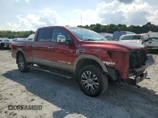 2016 Nissan Titan Platinum Reserve with VIN 1N6BA1F48GN507244, listed as a Copart auction lot 63213795 with 115,124 mi miles and Salvage title. Bid and sale history available at DreamBid. Image 4.