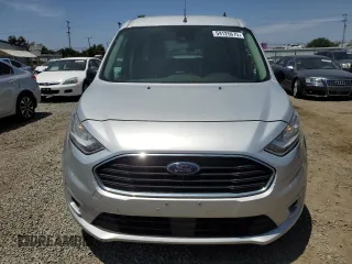 2019 Ford Transit Connect XLT with VIN NM0GE9F28K1427031, listed as a Copart auction lot 59125675 with 130,873 mi miles and Clean title. Bid and sale history available at DreamBid. Image 5.