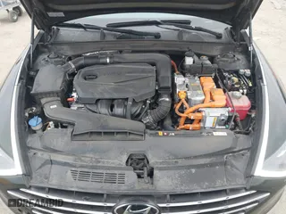2021 Hyundai Sonata Hybrid SEL with VIN KMHL34JJ1MA024239, listed as a IAAI auction lot 41707290 with 165,214 mi miles. Bid and sale history available at carsss.com. Image 10.