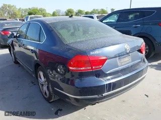 2013 Volkswagen Passat TDI SEL Premium with VIN 1VWCN7A33DC125396, listed as a IAAI auction lot 41862605 with 123,542 mi miles. Bid and sale history available at carsss.com. Image 3.