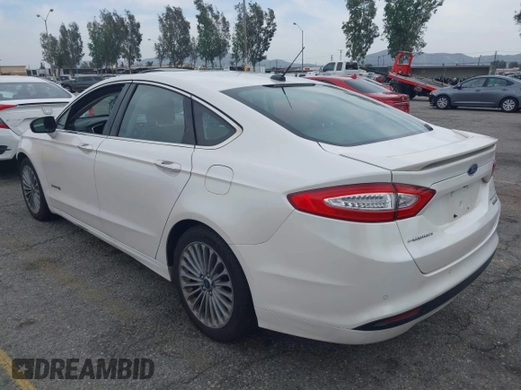 2013 Ford Fusion Titanium Hybrid with VIN 3FA6P0RUXDR386675, listed as a IAAI auction lot 42013986 with 89,349 mi miles. Bid and sale history available at carsss.com. Image 3.