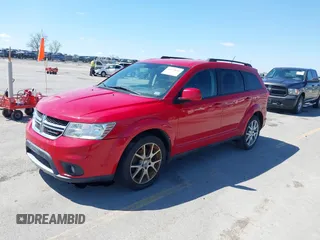 2013 Dodge Journey SXT with VIN 3C4PDCBB6DT555790, listed as a IAAI auction lot 42078616 with 171,643 mi miles. Bid and sale history available at carsss.com. Image 2.