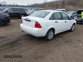 2007 Ford Focus S with VIN 1FAFP34N07W289097, listed as a IAAI auction lot 41984450 with 94,601 mi miles and . Bid and sale history available at DreamBid. Image 4.