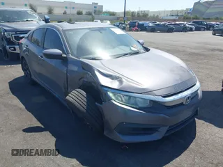 2018 Honda Civic LX with VIN 2HGFC2F57JH546731, listed as a IAAI auction lot 41979976 with 137,531 mi miles. Bid and sale history available at carsss.com. Image 13.