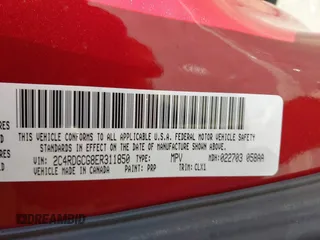 2014 Dodge Grand Caravan SXT with VIN 2C4RDGCG8ER311850, listed as a IAAI auction lot 40598088 with 138,010 mi miles and . Bid and sale history available at DreamBid. Image 9.
