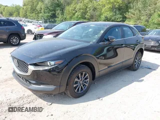 2021 Mazda CX-30 S with VIN 3MVDMBAL6MM264948, listed as a IAAI auction lot 42263077 with 13,614 mi miles and . Bid and sale history available at DreamBid. Image 2.