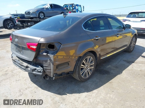2014 Kia Cadenza Premium z VIN KNALN4D70E5152333, wystawiony jako IAAI lot #42047660 z przebiegiem 107 686 mil mil oraz . Historia ofert i sprzedaży dostępna na DreamBid. Obrazek 4.