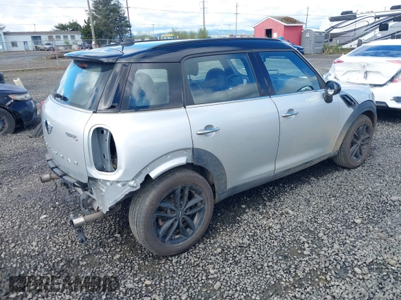 2014 MINI Countryman S with VIN WMWZC3C56EWP26003, listed as a IAAI auction lot 41884630 with 101,683 mi miles and . Bid and sale history available at DreamBid. Image 4.