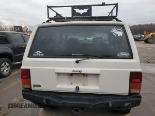1996 Jeep Cherokee Sport with VIN 1J4FJ68S9TL284984, listed as a Copart auction lot 86307644 with 136,142 mi miles and Salvage Title. Bid and sale history available at carsss.com. Image 6.