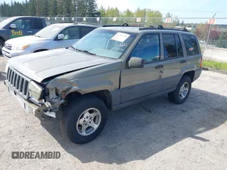 1997 Jeep Grand Cherokee Laredo with VIN 1J4GZ58S5VC500257, listed as a IAAI auction lot 41996034 with 222,513 mi miles and . Bid and sale history available at DreamBid. Image 2.