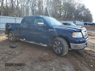 2007 Ford F-150 XLT with VIN 1FTPW02507KC10165, listed as a Copart auction lot 42901335 with 232,990 mi miles and Salvage title. Bid and sale history available at DreamBid. Image 4.