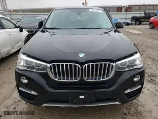 2015 BMW X4 xDrive28i with VIN 5UXXW3C58F0M87154, listed as a Copart auction lot 69211092 with 147,960 mi miles. Bid and sale history available at carsss.com. Image 5.
