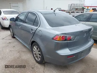 2016 Mitsubishi Lancer ES with VIN JA32U2FU4GU008977, listed as a IAAI auction lot 42139304 with 145,521 mi miles. Bid and sale history available at carsss.com. Image 3.