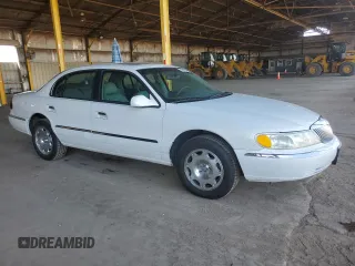 2001 Lincoln Continental with VIN 1LNHM97V31Y622782, listed as a Copart auction lot 74023344 with 116,672 mi miles and Salvage Title. Bid and sale history available at carsss.com. Image 4.