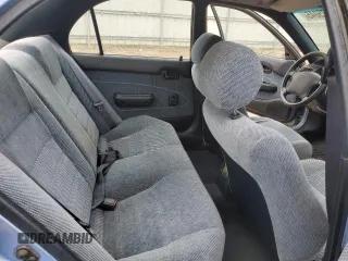 1995 Toyota Corolla DX with VIN 2T1AE09B5SC127586, listed as a Copart auction lot 57075045 with 244,969 mi miles and Salvage title. Bid and sale history available at DreamBid. Image 10.