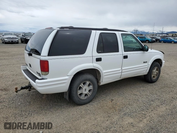 1997 Oldsmobile Bravada z VIN 1GHDT13W7V2711487, wystawiony jako Copart lot #57820455 z przebiegiem 182 784 mil mil oraz Tytuł czysty. Historia ofert i sprzedaży dostępna na DreamBid. Obrazek 3.