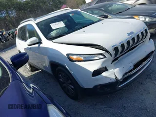2015 Jeep Cherokee Limited with VIN 1C4PJLDB9FW677367, listed as a IAAI auction lot 41826477 with 125,648 mi miles and . Bid and sale history available at DreamBid. Image 1.