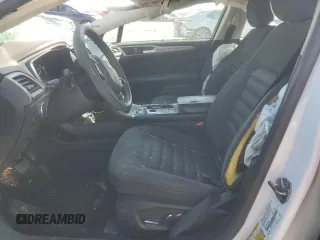 2017 Ford Fusion Hybrid SE с VIN 3FA6P0LU8HR356816, выставлен на аукционе Copart как лот 51005915 с пробегом Не указан миль и Списание • Salvage title. История ставок и продаж доступна на DreamBid. Изображение 7.