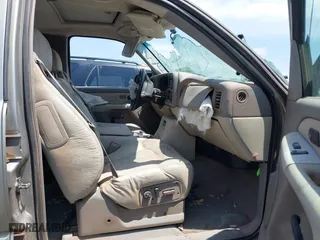 2001 Chevrolet Tahoe LS with VIN 1GNEK13TX1R192382, listed as a IAAI auction lot 39976735 with 243,083 mi miles. Bid and sale history available at carsss.com. Image 5.