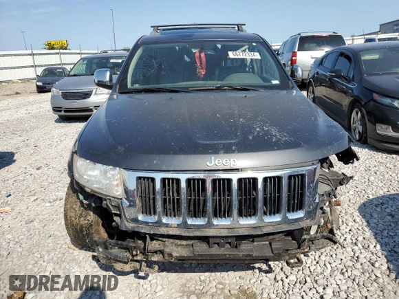 2011 Jeep Grand Cherokee 70th Anniversary with VIN 1J4RR4GT0BC632321, listed as a Copart auction lot 66772334 with 203,708 mi miles and Salvage Title. Bid and sale history available at carsss.com. Image 5.